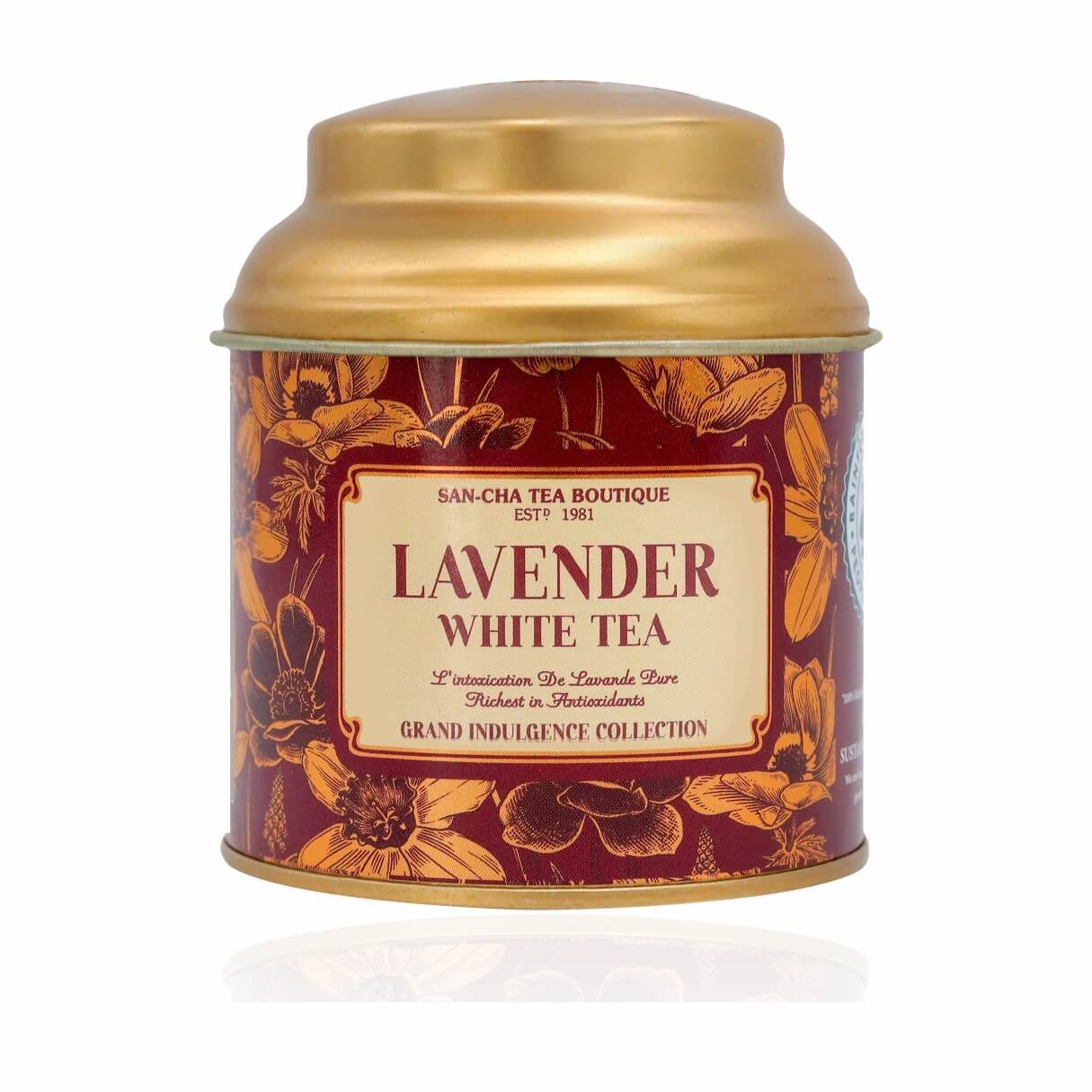 Tea canister with gold lid and lavender white tea label on a white background