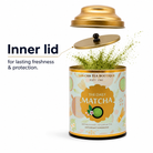Matcha green tea canister with an inner lid on a white background