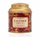 Tea canister with gold lid and lavender white tea label on a white background